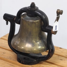 12"dia. brass bell with yoke marked Howard in 2 places