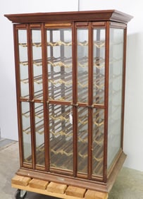 Wood & glass floor model ribbon cabinet with 4 swinging doors, 29"x32"x49.5"H