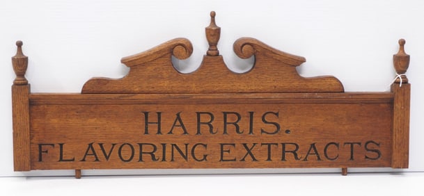 Wooden cabinet advertisement for Harris Falvoring Extracts, 26.5"L x 10.5"H