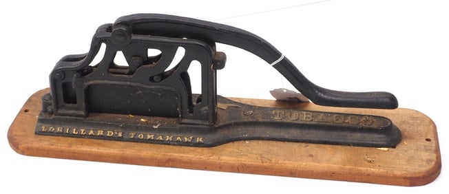 Lorillard's Tomahawk cast iron tobacco cutter, 17"L plus board