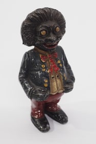 Golliwog still bank made of spelter, some original paint, 6"H
