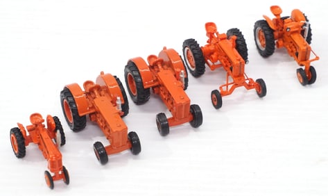 (5) Assorted scale Case Tractors