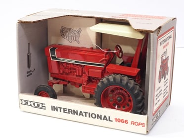 International 1066 with ROPS and box