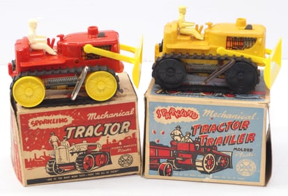 (2) Marx Sparkling Tractors