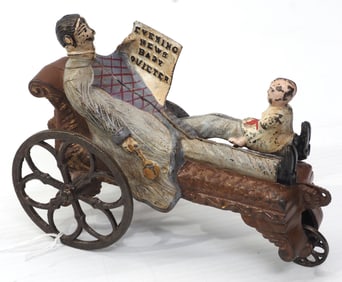 "Baby Quieter" cast iron pull toy