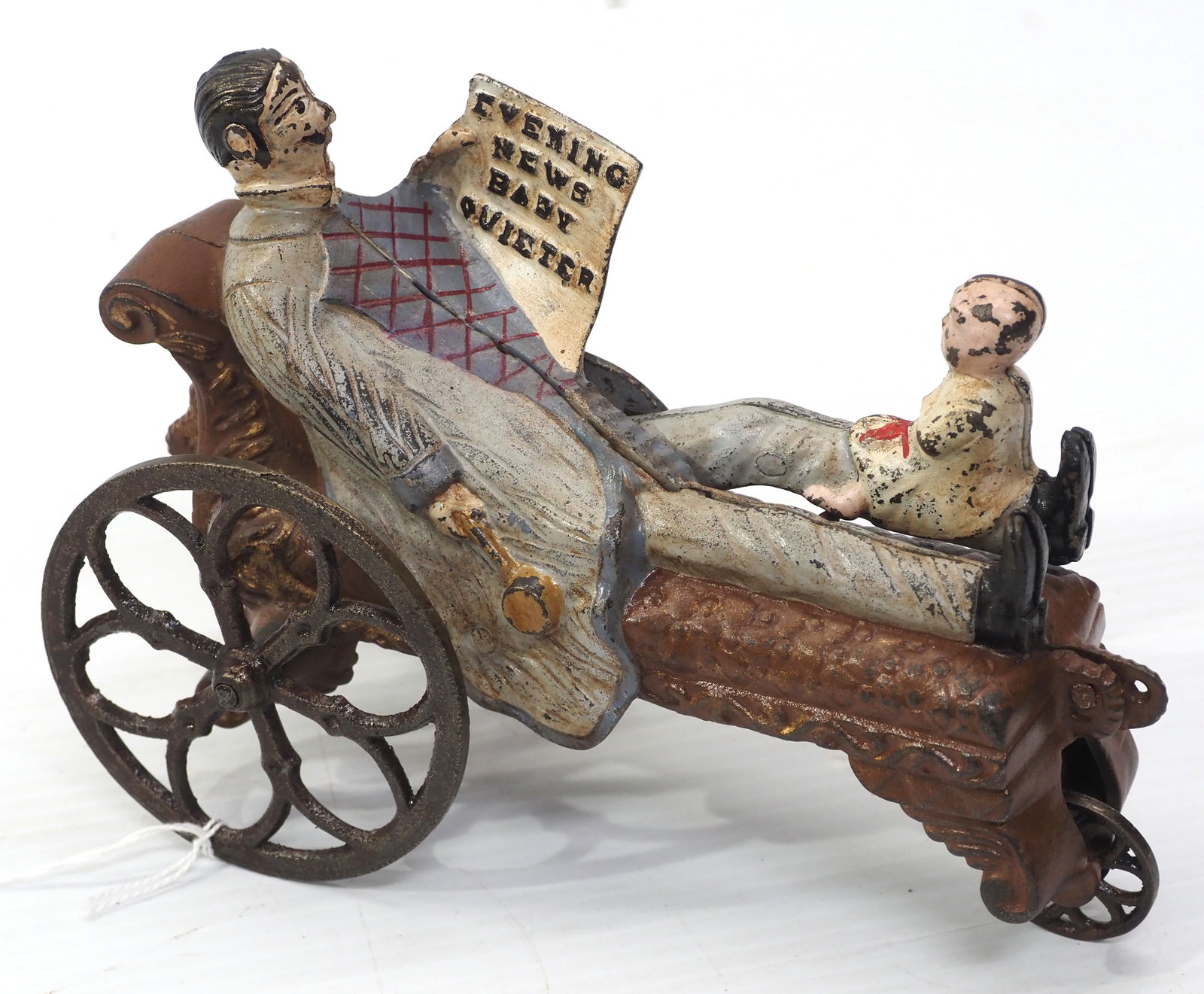 "Baby Quieter" cast iron pull toy: "Baby Quieter" cast iron pull toy with bell sound, by J.E. Stevens - Very Good