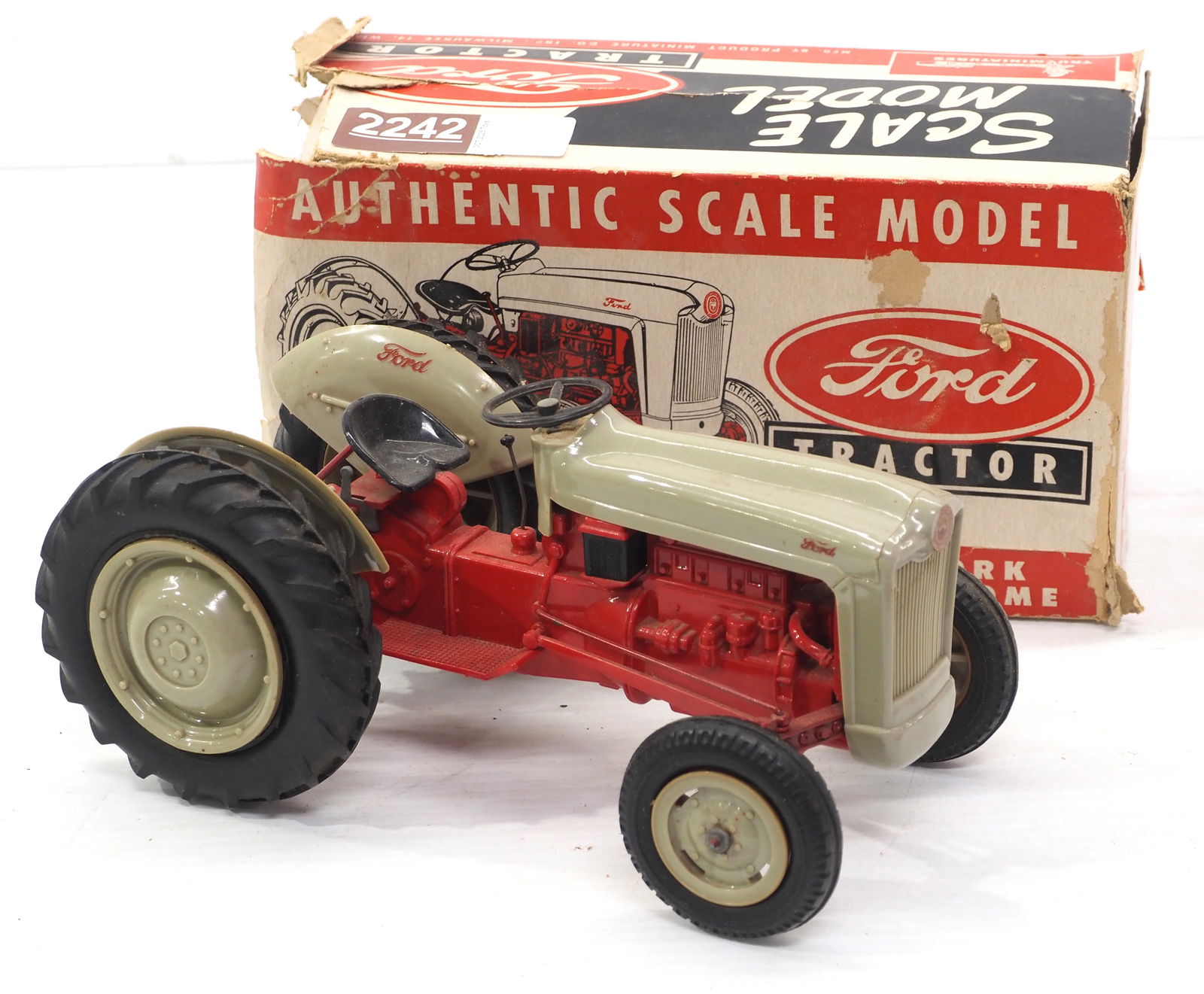 1/12 scale plastic Ford tractor No.3154: Product Miniatures 1/12 scale plastic Ford tractor No.3154 with box - Good, box is Rough