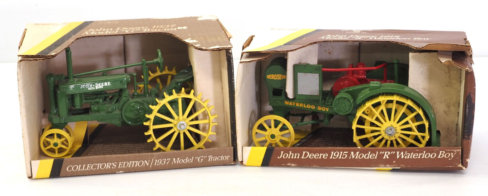 (2) Ertl John Deere tractors in boxes: (2) Ertl 1/16 scale John Deere tractors in boxes: 1937 Model G / 1915 Model R Waterloo Boy