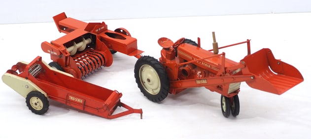 Tru-Scale tractor with implements