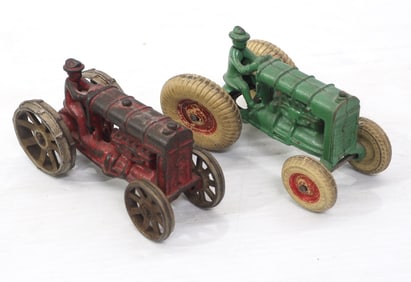 (2) Small cast iron tractors