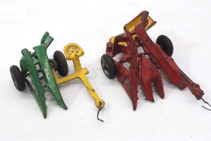 Arcade 2-row and 1-row cast iron corn pickers