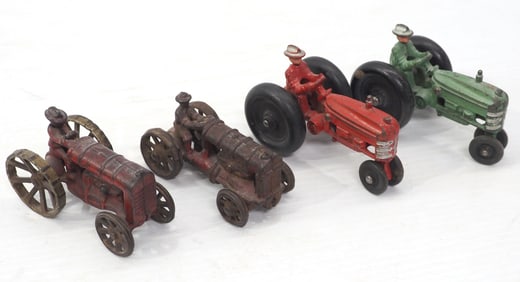 (4) Small cast iron tractors with drivers