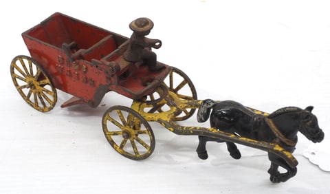 Cast iron horse-drawn dump wagon