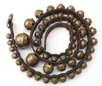Leather strap of (50) graduated brass sleigh bells
