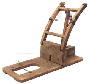 Early wooden goat holder