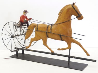 Large metal horse with sulky weathervane