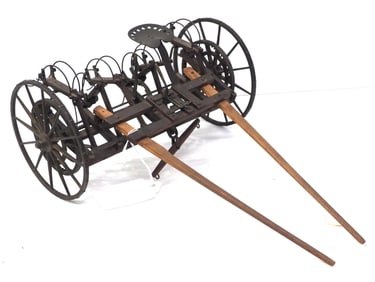 Salesman sample horse-drawn hay tedder