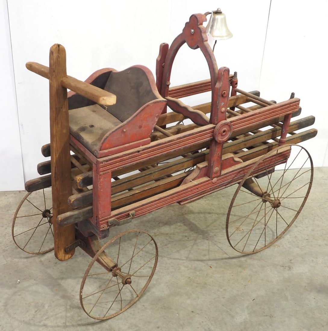 Child's pull toy wooden fire ladder wagon: Child's pull toy wooden fire ladder wagon with ladders, bell and front seat, 47"x23"x40" plus handle & ladders - Very Good * * White Glove Delivery available, please contact the auction house for deta