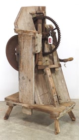 Early wooden hand-crank corn sheller