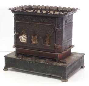 Early cast iron, sad iron heater