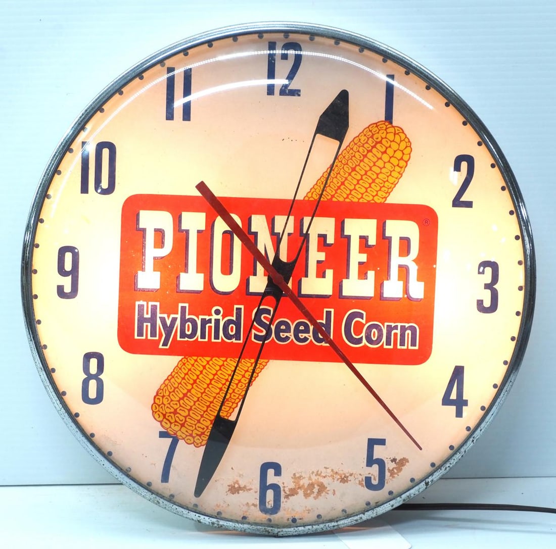 Pioneer Hybrid Seed Corn lighted clock: 15"dia. metal & glass Pioneer Hybrid Seed Corn lighted clock by Pam Clock Co. - Good, works