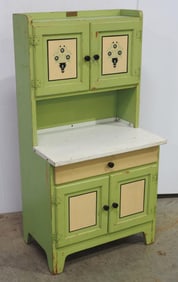 Child-size Hoosier cabinet from 1931