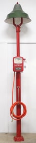 Gas station light with mounted Eco Tire-Meter