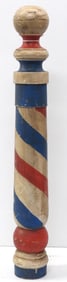 Wooden painted barber shop pole