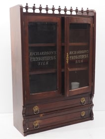 Wooden country store spool cabinet