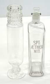 (2) Glass apothecary jars with lids