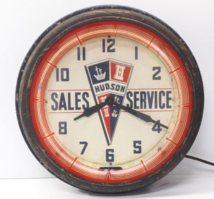 Hudson Sales & Service neon clock