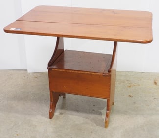 Early wooden seat with storage