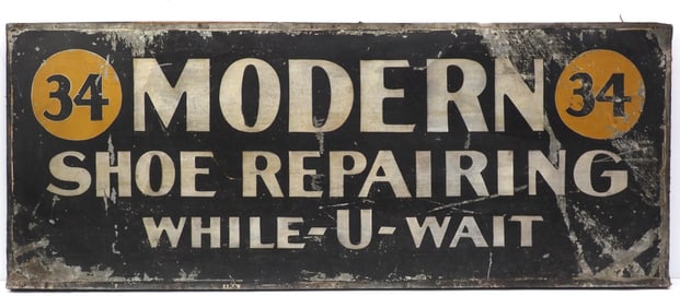 Modern Shoe Repairing While-U-Wait sign
