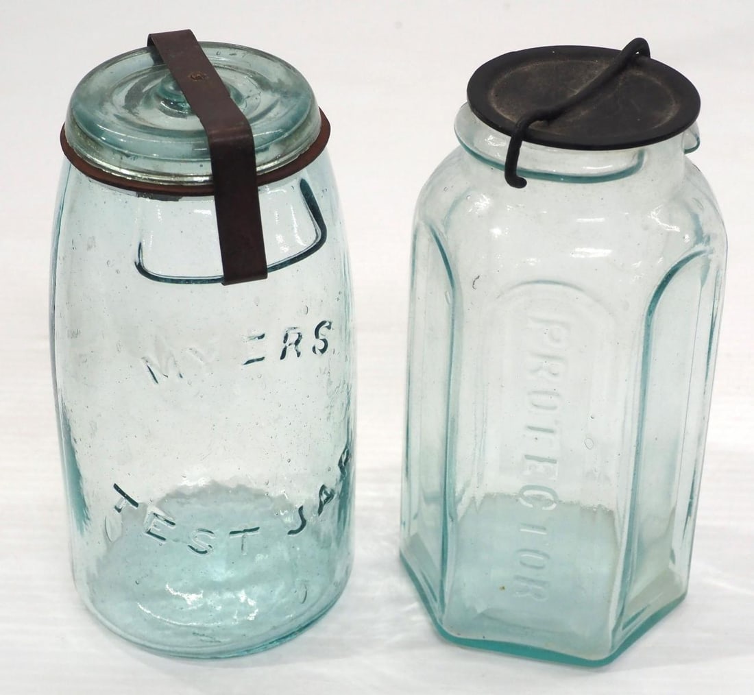 (2) Early glass 1-quart canning jars: (2) Early glass 1-quart canning jars: Protector with metal lid / Myers Test Jar with glass lid