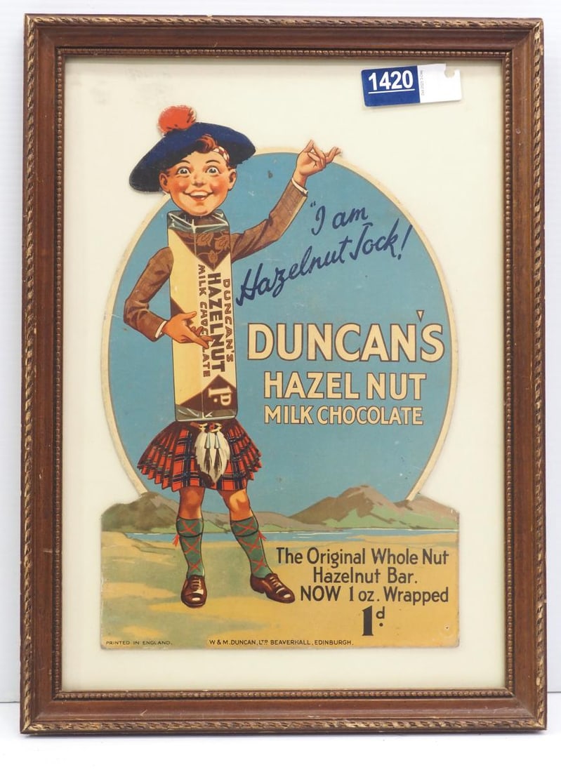 Duncan's Hazel Nut Milk Chocolate adv.: 9.5"x14" cardboard Duncan's Hazel Nut Milk Chocolate advertisement, made in England, in wooden frame