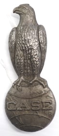 Case 'eagle on world' metal badge