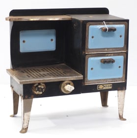 Child's metal toy stove by Empire