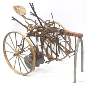 Salesman sample horse-drawn cultivator