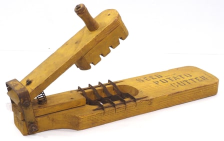 Early wooden seed potato cutter
