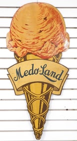 Medo-Land die-cut ice cream cone-shaped sign