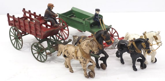 (2) Cast iron horse-drawn wagons with drivers