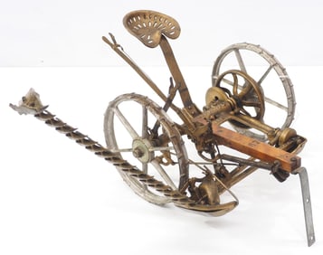 Salesman sample horse-drawn hay mower