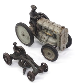 Cast iron tractor marked W&K / Cast iron grader