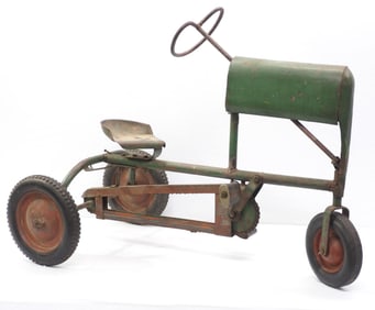 Early metal child's pedal tractor
