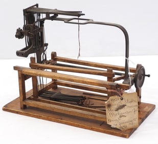Patent model shuttle driving mechanism for looms