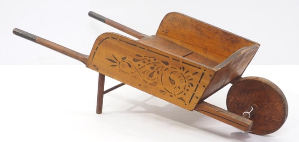 Early wooden child's wheelbarrow
