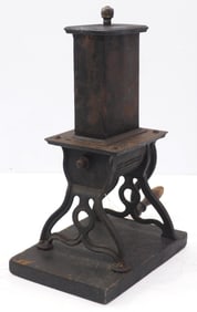 Early hand-crank spice grinder