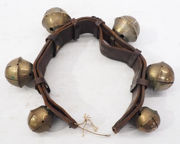 Large leather strap with large brass harness bells