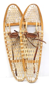 Pair of wooden snow shoes