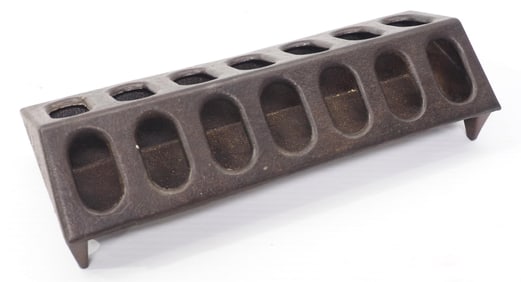 Cast iron chicken feeder